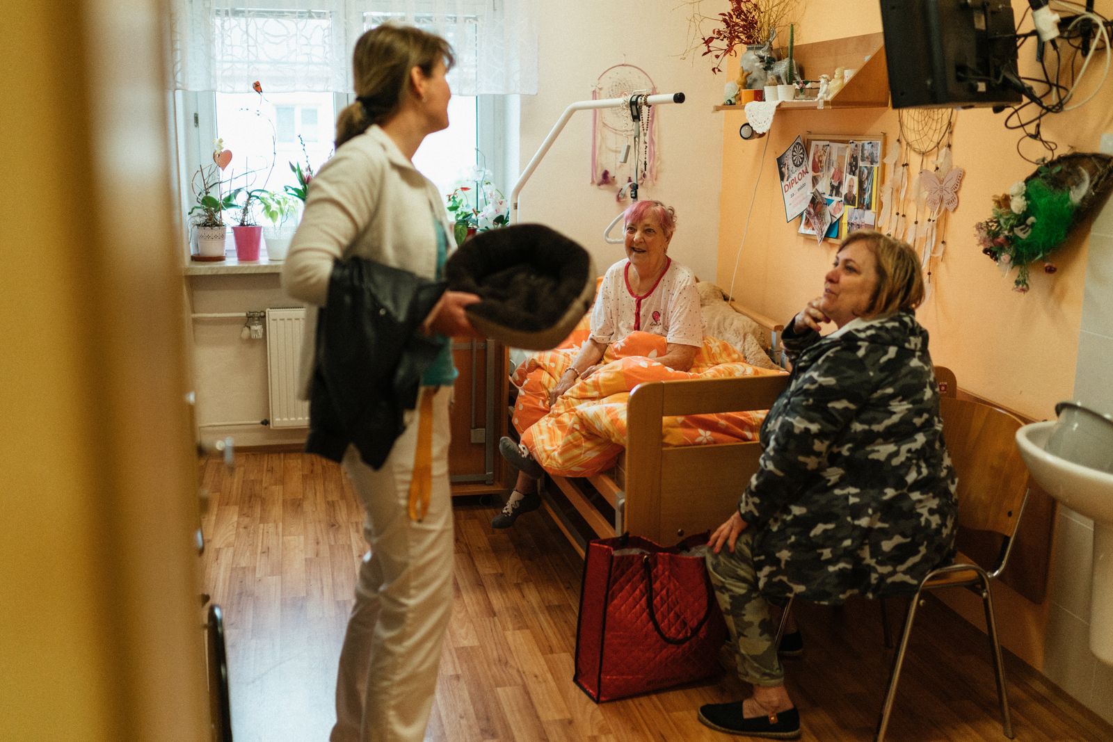 An Eben Care support worker visiting a participant at home